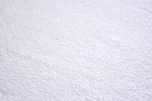 Soft white textile background with texture for design and fabric concepts. photo