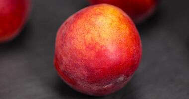 ripe and sweet nectarine fruit on the table photo