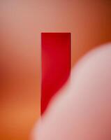 A red square on a brown background photo