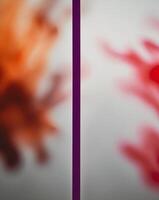 Two different pictures of red and orange paint photo