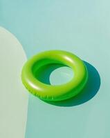 An inflatable ring floating in a pool photo