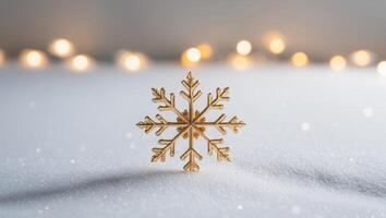 Golden Snowflake on Sparkling Winter Snow with Blurred Lights Background. photo