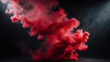 Red smoke on black background photo