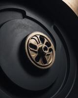 Illuminated Gear in a Dark Mechanical Background. photo