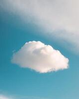 A white cloud is in the sky photo