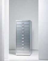 A silver filing cabinet with six drawers photo