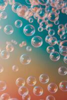 Soap bubbles floating in the air on a colorful background photo