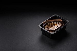 Sandwich with brioche bun, roast beef and vitello tonato sauce photo