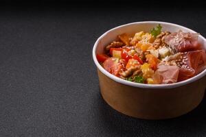Appetizing salad with prosciutto, pumpkin, cheese and tomatoes photo