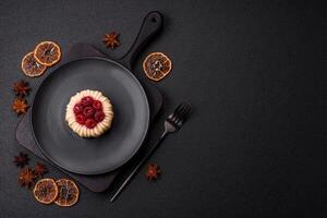 Sweet mousse tart with raspberries and filling photo