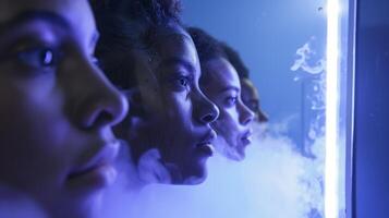 A group of dancers taking a break from rehearsals to try out a cryotherapy chamber using the intense cold to soothe their sore muscles and release stress photo