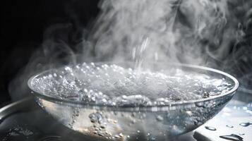 The steam rising from a tub of ice water as a person gets out leaving a chilling sensation in the air photo