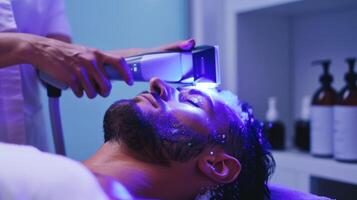 A man lying back on a bench while a the applies a cryotherapy wand to his forehead using the targeted cold therapy for stress reduction photo