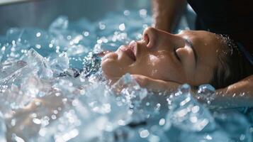 14. A coach or mentor standing by a persons side offering guidance and support as they take on the mental challenge of an ice bath photo