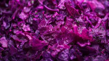 A macro shot of a deep purple e with delicate shreds of pink and green throughout. The mix gives off an almost floral scent and adds a pop of color to any dish photo