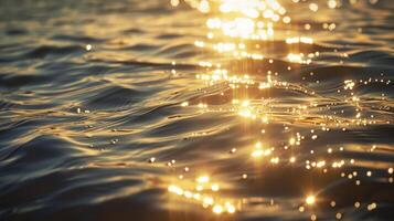 Watching as the sunlight dances on the surface of the water creating a mesmerizing display of shimmering reflections photo