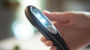 Closeup of a probe being p on the surface of the skin to measure hydration levels. photo