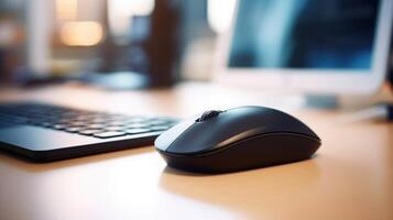 Closeup of a sleek wireless mouse resting on a desk next to a notebook and pen. photo