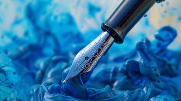 An artistic shot of a vintage fountain pen with the nib delicately dipped in a pool of vibrant blue ink capturing the beauty and artistry of the writing instrument photo