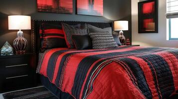A striking black and red striped comforter graces the bed in this bold modern bedroom complemented by sleek black furniture and a mix of geometric patterns in the accent pillows photo