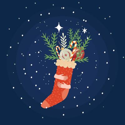 Christmas and new year greeting card with hands holding christmas sock