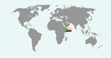 Pin map with Comoros flag on world map. illustration. vector