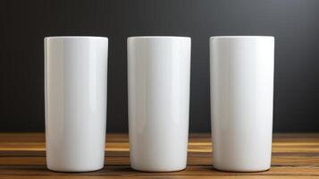 Three white vases on a wooden table photo
