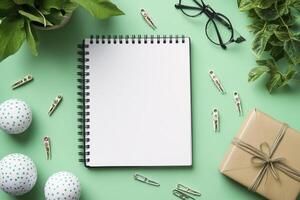 Top view of Blank notebook surrounded by decorative elements photo