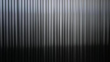 Abstract image featuring vertical metallic lines with a glossy, reflective surface, creating a sleek and minimalistic dark pattern. photo