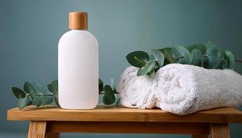 White lotion bottle with a wooden cap, next to rolled white towels and eucalyptus leaves, on a wooden bench in a serene setting. photo