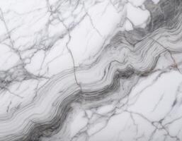 Close-up of a white marble surface featuring elegant gray veins, creating a natural and luxurious texture ideal for backgrounds. photo