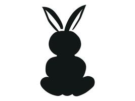 Black Silhouette of a Toy Rabbit Isolated on White Background. E vector