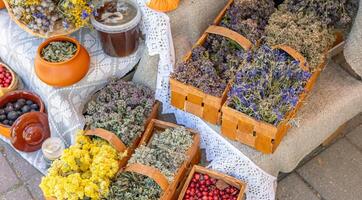 Market stall selling natural goods. Showcasing a variety of dried herbs. Traditional craftsmanship. Local markets, a craft fair, or even just a visual reminder of the beauty of handmade goods. photo