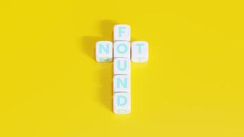White Not Found - Word On Plastic Blocks - With Yellow Background photo