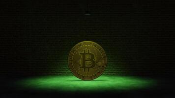 Golden Bitcoin under a green spotlight in front of a brick wall photo
