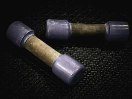 The abstract art design background of Dumbbell,sport training tools,dramatic tone, photo