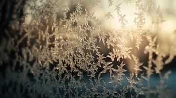 A window with frosted glass and snowflakes on it photo