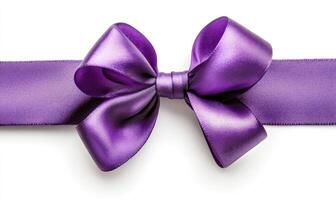 Purple satin ribbon with bow on white background photo