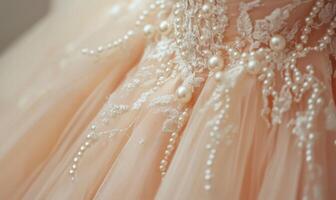 A beautiful white dress with a lot of pearls on it photo