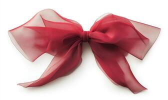 A red ribbon with a bow is shown on a white background photo