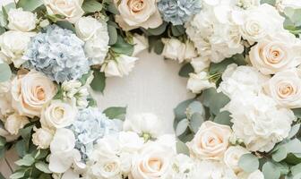 A white and blue flower arrangement with a green leaf in the center photo