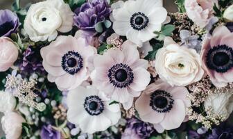 A bouquet of flowers with a mix of purple and white flowers photo