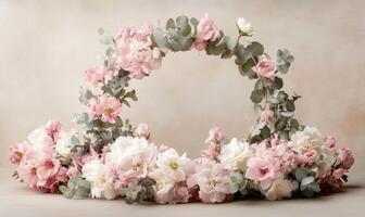 A flower arrangement with pink and white flowers in a circular shape photo