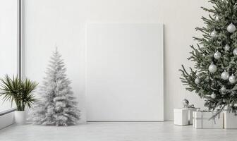 A white wall with a white frame and a white Christmas tree in the background photo