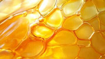 Close-up of Golden Liquid with Bubbles and a Smooth Surface photo