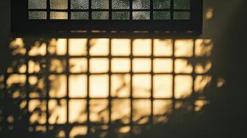 A Gridded Shadow Cast by a Window on a Wall photo