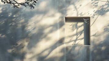 A Window with Branch Shadows on a Gray Wall photo
