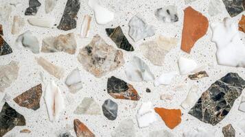 Close-up of White Terrazzo with Multicolored Stone Inclusions photo