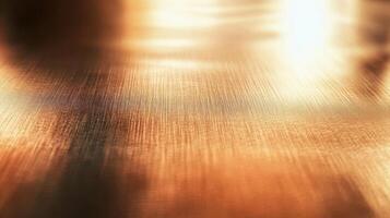 Close-up of a Shiny, Golden-Brown Metallic Surface with Horizontal Lines photo
