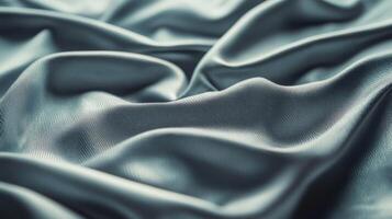 Abstract Close-Up of Draped Smooth Grey Fabric photo